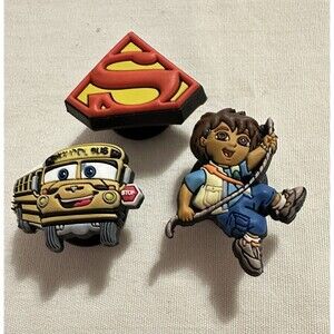 CROCS Jibbitz Charms – Lot of 3 (Dora the Explorer, Superman, School Bus)
